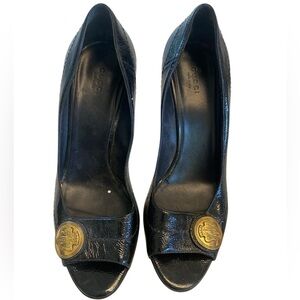 Gucci Black Heels with Gold Emblem